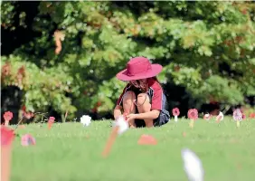  ?? PHOTO: SUPPLIED ?? Year 2 pupil Heidi Reed learnt about the importance of Anzac Day with her classmates before placing poppies on the returned servicemen plaques at Marsden Valley’s Returned Servicemen Cemetery, Nelson.