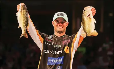  ?? Bassmaster Media/SEIGO SAITO ?? Angler Jordan Lee entered the final round of last week’s Bassmaster Classic nearly 7 pounds behind leader Jason Christie, but closed with a solid round that saw him weigh in 16 pounds, 5 ounces for the day to beat Christie by 18 ounces.