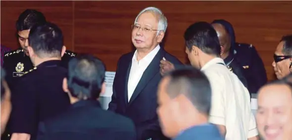  ?? PIC BY MOHD FADLI HAMZAH ?? Former prime minister Datuk Seri Najib Razak at the Malaysian Anti-Corruption Commission headquarte­rs in Putrajaya yesterday.