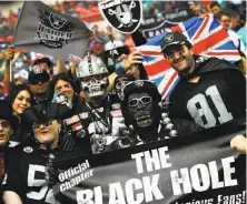  ?? Richard Heathcote / Getty Images 2014 ?? Some Raiders fans were in London in 2014 when the team lost to Miami 38-14 — Dennis Allen’s last game as Oakland’s coach.