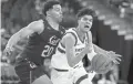  ?? JOHN LOCHER/AP ?? Stanford's Tyrell Terry (3) drives around California's Matt Bradley (20) on March 11 in Las Vegas.