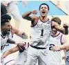  ?? MICHAELCON­ROY/AP ?? Gonzaga guard Jalen Suggs
(1) celebrates making the game-winning 3-pointer at the overtime buzzer against UCLA on Saturday night in the Final Four in Indianapol­is. Gonzaga won 93-90.