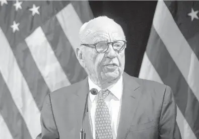  ?? MARY ALTAFFER/AP ?? Rupert Murdoch introduces Secretary of State Mike Pompeo during the Herman Kahn Award Gala in New York in 2019.