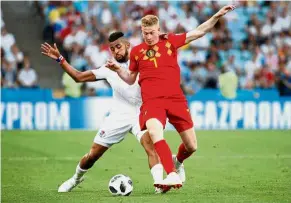  ?? — Reuters ?? Hoping to bounce back: Belgium’s Kevin De Bruyne (right) vying for the ball with Panama’s Anibal Godoy during their Group G match at Fisht Stadium on Monday.