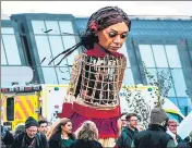  ?? AFP ?? Little Amal, a giant puppet depicting a Syrian refugee girl, after an appearance at COP26 in Glasgow.