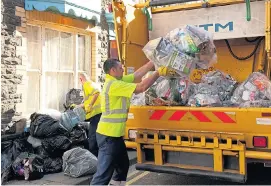  ??  ?? Piled up bags of rubbish collected in nearby Aberystwyt­h, west Wales