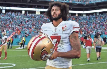  ?? STEVE MITCHELL, USA TODAY SPORTS ?? Sociologis­t Harry Edwards considers Colin Kaepernick, above, this generation’s Muhammad Ali.