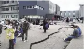  ?? KYODO NEWS / AP ?? Cracks are seen on the ground in Wajima, Ishikawa Prefecture, Japan, on Monday following an earthquake. Japan issued tsunami alerts Monday after a series of strong quakes in the Sea of Japan.