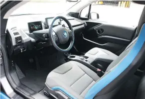  ??  ?? The i3’s controls, gauges and screens are all up to BMW’s high standards. The ergonomics for front seat passengers are also great.