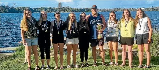  ?? ?? Palmerston North canoe polo team Valkyries Black celebratin­g winning the national A grade competitio­n in Auckland last weekend.