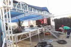  ?? ?? Workers put final touches yesterday on a stage where President Mnangagwa is expected to launch the National Culture Month in Binga today.