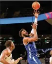  ?? CURTIS COMPTON/AJC 2020 ?? Georgia State’s Eliel Nsoseme grabs a rebound during a key win
over Georgia Tech in November.