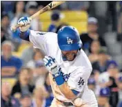  ?? Wally Skalij Los Angeles Times ?? CHRIS TAYLOR IS HIT on the elbow by a pitch in the sixth inning to give the Dodgers a 3-1 lead.