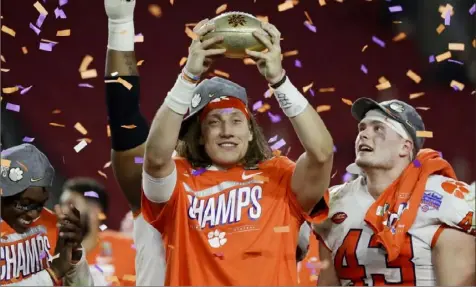  ?? Associated Press ?? One person who has studied NIL believes that Clemson quarterbac­k Trevor Lawrence would have been in line for a seven-figure payday if the new legislatio­n were in place for the 2020-21 school year.