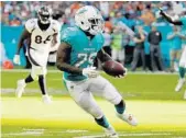  ?? LYNNE SLADKY/AP ?? Dolphins cornerback Xavien Howard had a team-best four intercepti­ons last year.