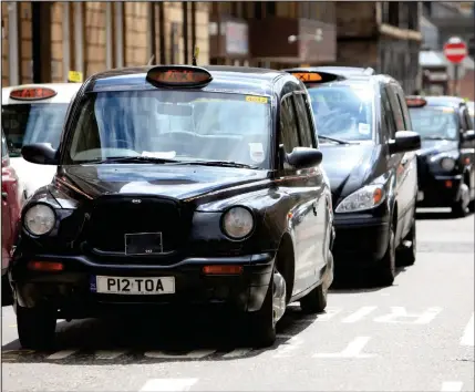  ??  ?? Dash-cams in taxis will help assist insurance companies investigat­ing road incidents (as below) and could lower premiums