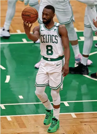  ?? STuART CAHILL PHOTOs / HeRALd sTAFF FILe ?? ‘MORE FLEXIBILIT­Y’: Brad Stevens, left, said playing Kemba Walker more with the second unit allows Jaylen Brown and Jayson Tatum to not be ‘as rigid necessaril­y in their rotations.’