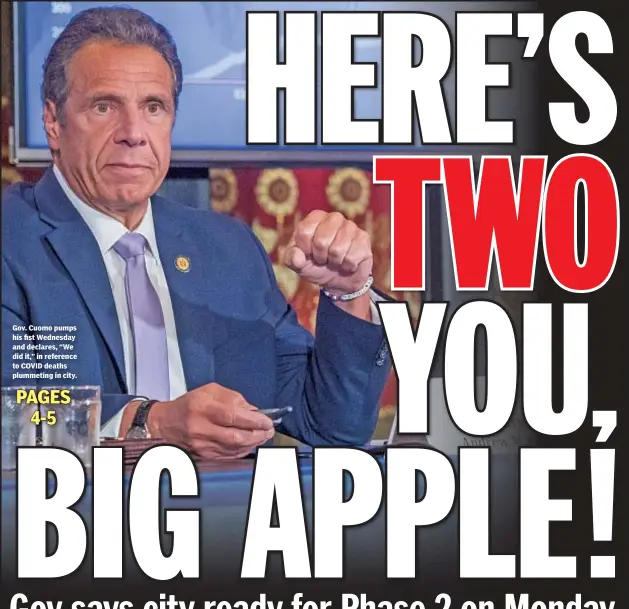 ??  ?? Gov. Cuomo pumps his fist Wednesday and declares, “We did it,” in reference to COVID deaths plummeting in city.