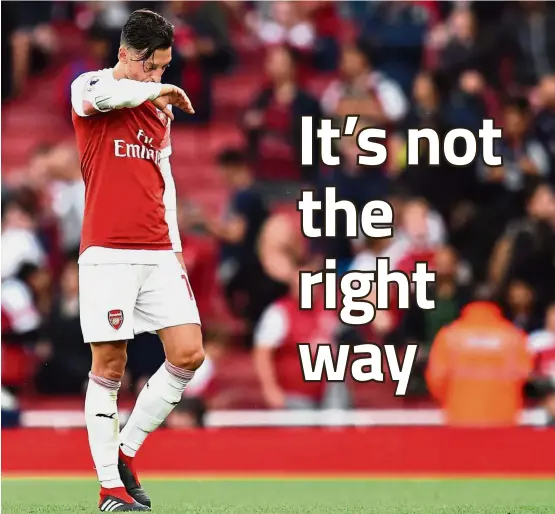  ??  ?? Enough is enough: Arsenal midfielder Mesut Ozil announced his internatio­nal retirement in July after Germany crashed out of the World Cup group stage in Russia. — AFP