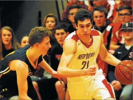  ?? ANDREW AURIGEMA - ONEIDA DAILY DISPATCH ?? VVS senior Jake Engler attempts to get by a defender in Section III Class B quarterfin­al play on Tuesday, Feb. 20.