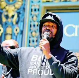  ?? AP ?? Jamie Foxx speaks to a large crowd during a “kneel-in” to protest police racism on the steps of City Hall in San Francisco, California, yesterday.