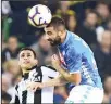  ??  ?? Udinese’s Italian forward Kevin Lasagna (left), and Napoli’s Spanish defender Raul Albiol go for a header during the Italian Serie A football match Udinese vs Napoli on Oct 20 at the Friuli Stadium inUdinese. (AFP)