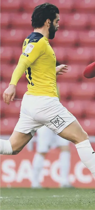  ??  ?? Sunderland captain Max Power scores the third goal to seal the 3-1 win over Oxford United. Photo by Stu Forster/