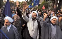  ?? AP-Yonhap ?? Iranian demonstrat­ors chant slogans during an anti-Israel gathering in Tehran, Iran, Monday.