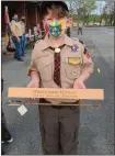  ??  ?? Eleven-year-old Landon Morash with his Arrow of Light Award. Morash said the crossover ceremony meant a lot of him and his friends and he’s excited for upcoming adventures in the Scouts.
Theo Kislat proudly displays his Arrow of Light Award. When a Cub Scout has completed all 14 his required challenges, he receives the award which is the highest honor Cub Scout can receive.