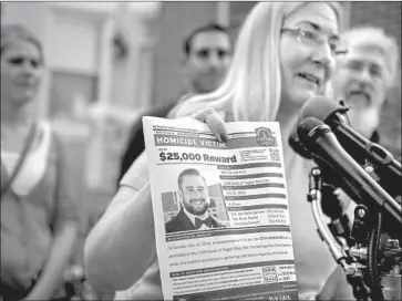  ?? Michael Robinson Chavez Washington Post/Getty Images ?? MARY RICH, the mother of Democratic National Committee staffer Seth Rich, weeks after his 2016 slaying.