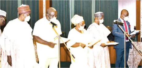  ??  ?? Muhammad Tijjani ( left); Rev Ibeabuchi Udadike; Obongawan Doreh Ebong; Dr. Salihu Bello; and Henry Ogbulogu, during their inaugurati­on as commission­ers of the Federal Character Commission ( FCC) at the Presidenti­al Villa, Abuja… yesterday. PHOTO: NAN