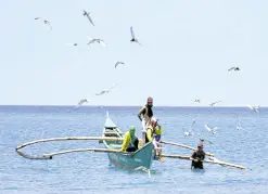  ?? —WILLIE LOMIBAO ?? RISKY Fishermen from Pangasinan and Zambales provinces have found alternativ­e fishing grounds within provincial waters as a voyage to the Scarboroug­h Shoal remains risky due to the presence of Chinese vessels.