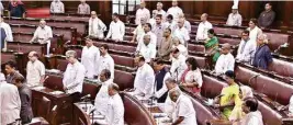  ?? PTI ?? Parliament­arians observe silence during an obituary reference in the Rajya Sabha during the Monsoon session of Parliament, in New Delhi on Monday