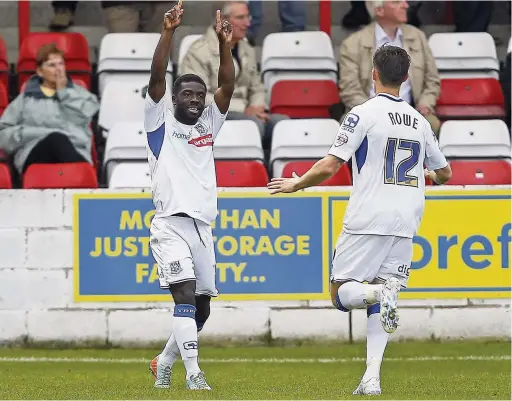  ?? Ian Smith ?? Abdulai Bell Baggie, pictured in his Tranmere days, was celebratin­g in Stockport colours at the weekend