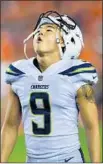  ?? Dustin Bradford Getty Images ?? YOUNGHOE KOO reacts after missing what would have been a game-tying field goal in loss to Denver last season.