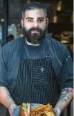  ??  ?? Executive chef E.J. Miller is overseeing the menu for the Sporting Club.