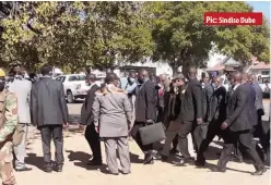  ?? Pic: Sindiso Dube ?? President Emmerson Mnangagwa being led to the hanging tree in Bulawayo by historian Pathisa Nyathi, yesterday