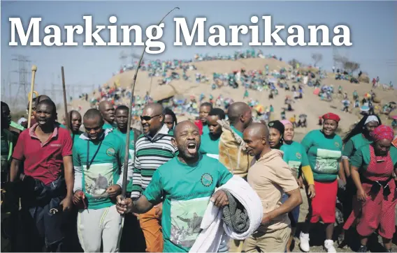  ?? Pictures: Reuters ?? SAY IT LOUD. Miners and members of the Associatio­n of Mineworker­s and Constructi­on Union attend the fifth anniversar­y commemorat­ions to mark the day in 2012 when 34 striking miners were shot dead by police outside Lonmin’s Marikana platinum mine in...