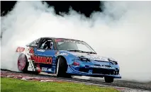  ??  ?? Adam Davies won the D1NZ National Drifting Championsh­ip round at Manfeild.