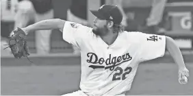  ?? RICHARD MACKSON/USA TODAY SPORTS ?? Clayton Kershaw, who is signed through 2020, has won 153 games during the regular season in 11 seasons with the Dodgers.