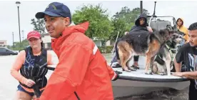  ?? SCOTT CLAUSE/USA TODAY NETWORK ?? Volunteers and first responders rush to the rescue in Houston on Aug 29, 2017, after Hurricane Harvey slammed into Texas.