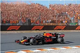  ?? Picture: Getty ?? Max Verstappen on the slow-down lap after his victory