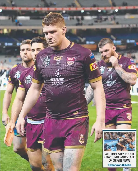  ?? Picture: GETTY IMAGES ?? Dylan Napa (centre) and fellow Maroons prop Jarrod Wallace have been told to lift their game.