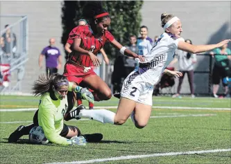  ?? BROCK UNIVERSITY ?? Brock goalkeeper Marilena Spagnolo dives to make a save against Western during women's university Sunday at Alumni Field Saturday in St. Catharines.