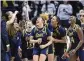  ?? CLOE POISSON / HARTFORD COURANT / AP ?? Notre Dame guard Hannah Hidalgo (3) and teammates celebrate a win over UConn in a game in Storrs, Conn., on Saturday.
