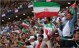  ?? ?? Iranian supporters are likely to be the focus of TV cameras for the duration of the tournament