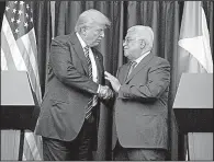  ?? AP/EVAN VUCCI ?? President Donald Trump and Palestinia­n President Mahmoud Abbas conclude an appearance Tuesday in the West Bank city of Bethlehem.