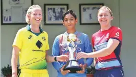  ??  ?? From left: Aus’s Meg Lanning, India’s Harmanpree­t Kaur & England’s Heather Knight with tri-series trophy