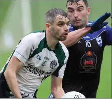  ??  ?? AGB’s Karl Kirwan battles with Blessingto­n’s Eoin Keogh.