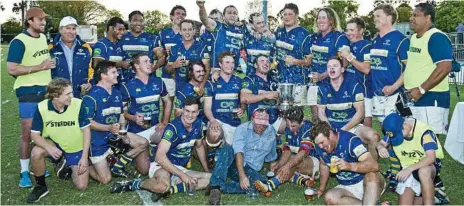  ?? Photo: Nev Madsen ?? LET'S PARTY: Premiershi­p celebratio­ns begin for the Wheatmen after their 2017 Risdon Cup grand final win over Goondiwind­i.